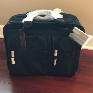 Tumi briefcase:  T-Pass expandable medium laptop briefcase